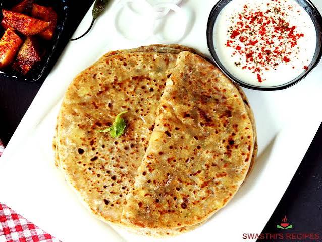 Aloo Pyaz Paratha — pure vegetarian dish by Rasalaya